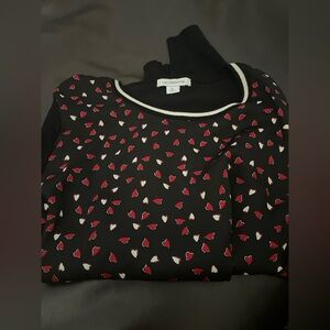 Red & white hearts printed on satiny top.
